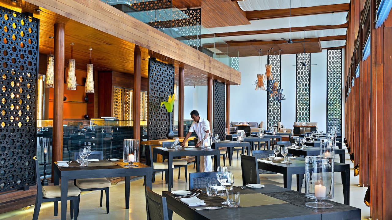 Casual all day dining by the pool with ocean views