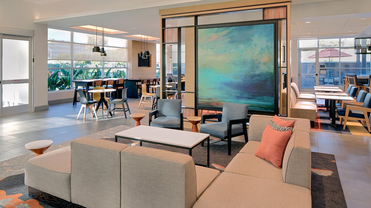 Lobby with large seating area at Hyatt House Irvine/John Wayne Airpor