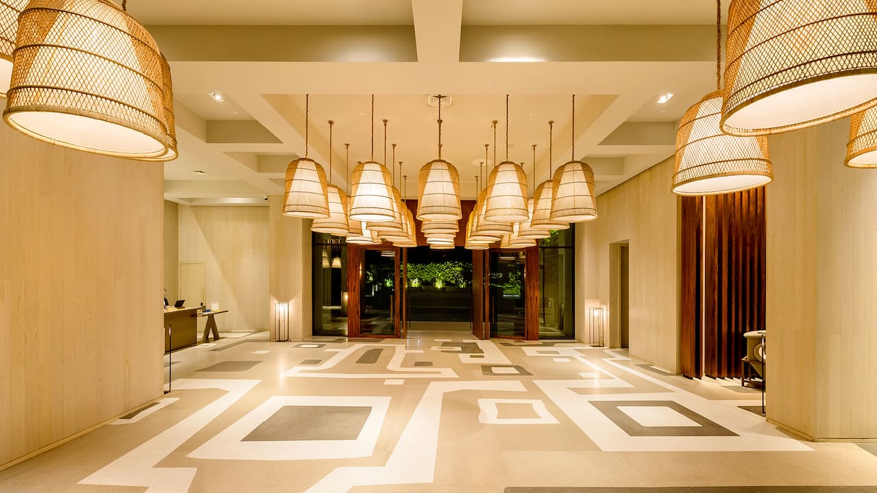 Hotel lobby with coastal style light fixtures