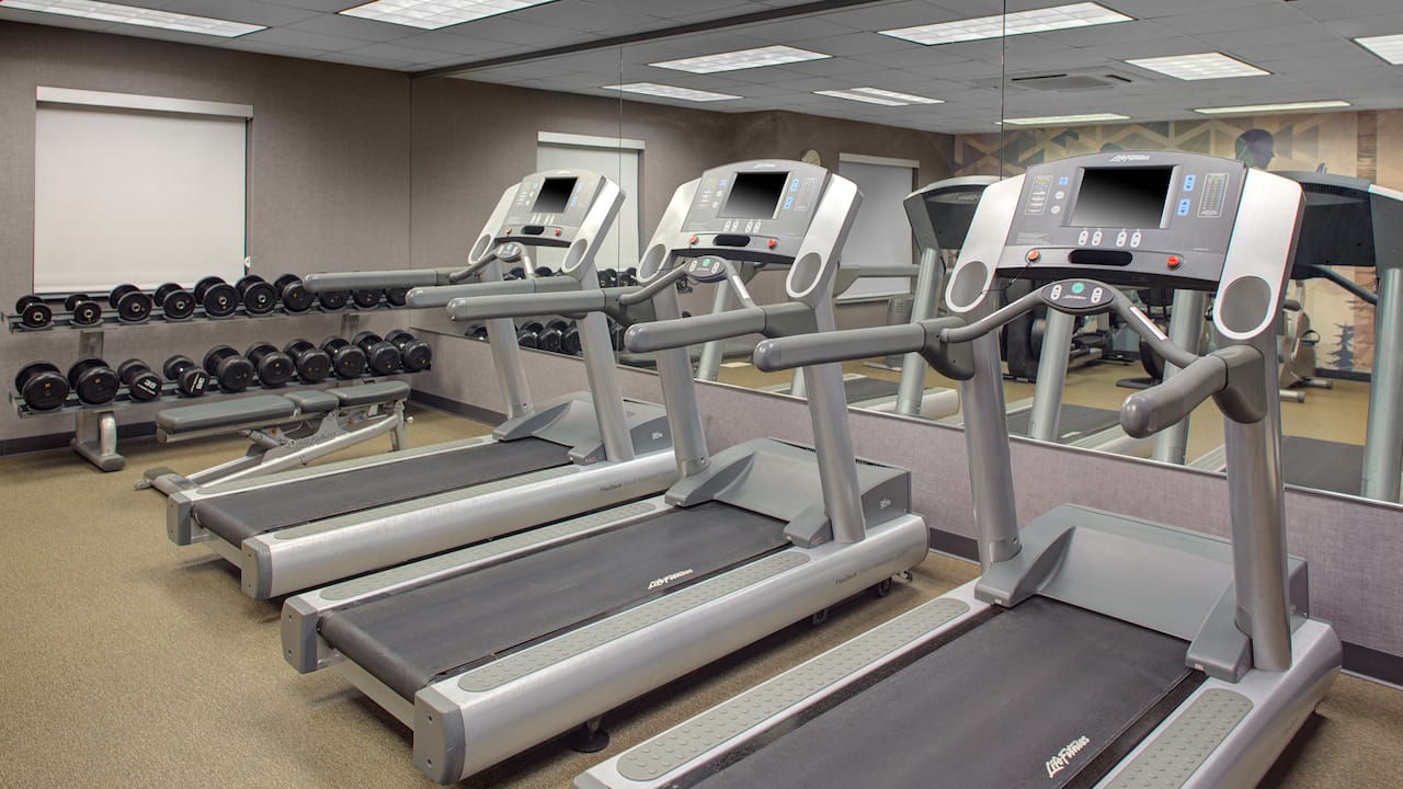 Whippany hotel 24/7 fitness center with treadmills and free weights at Hyatt House Parsippany / Whippany