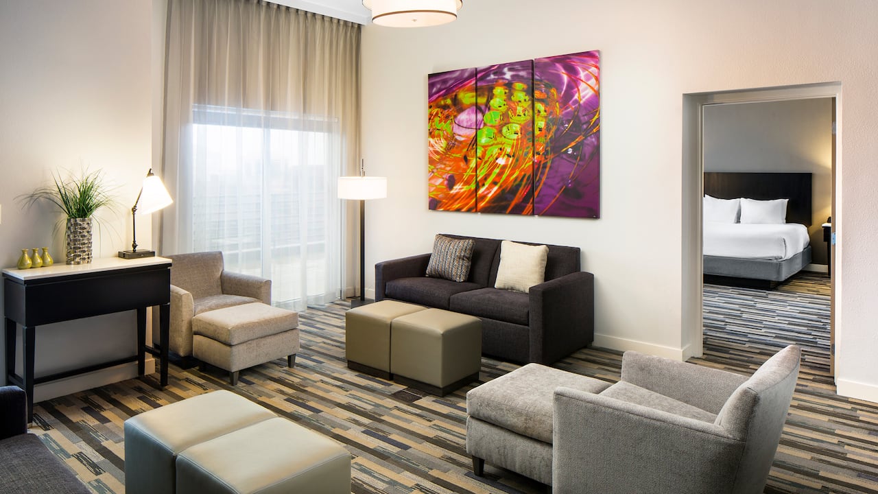 Hyatt House Charlotte / City Center Diamond Suite Living Room with Pull out Sofa Sleeper
