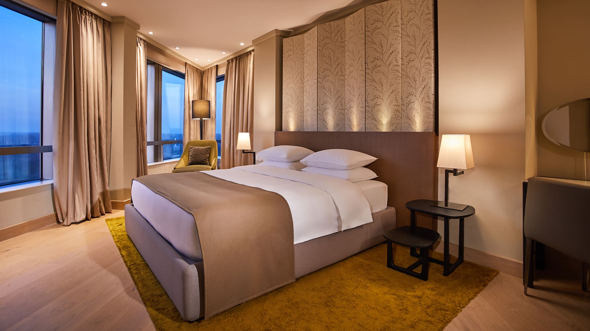 Luxurious 142m² Diplomatic Suite with king bed, living/dining area, study, kitchen, spa bathtub, steam room, and Regency Club access