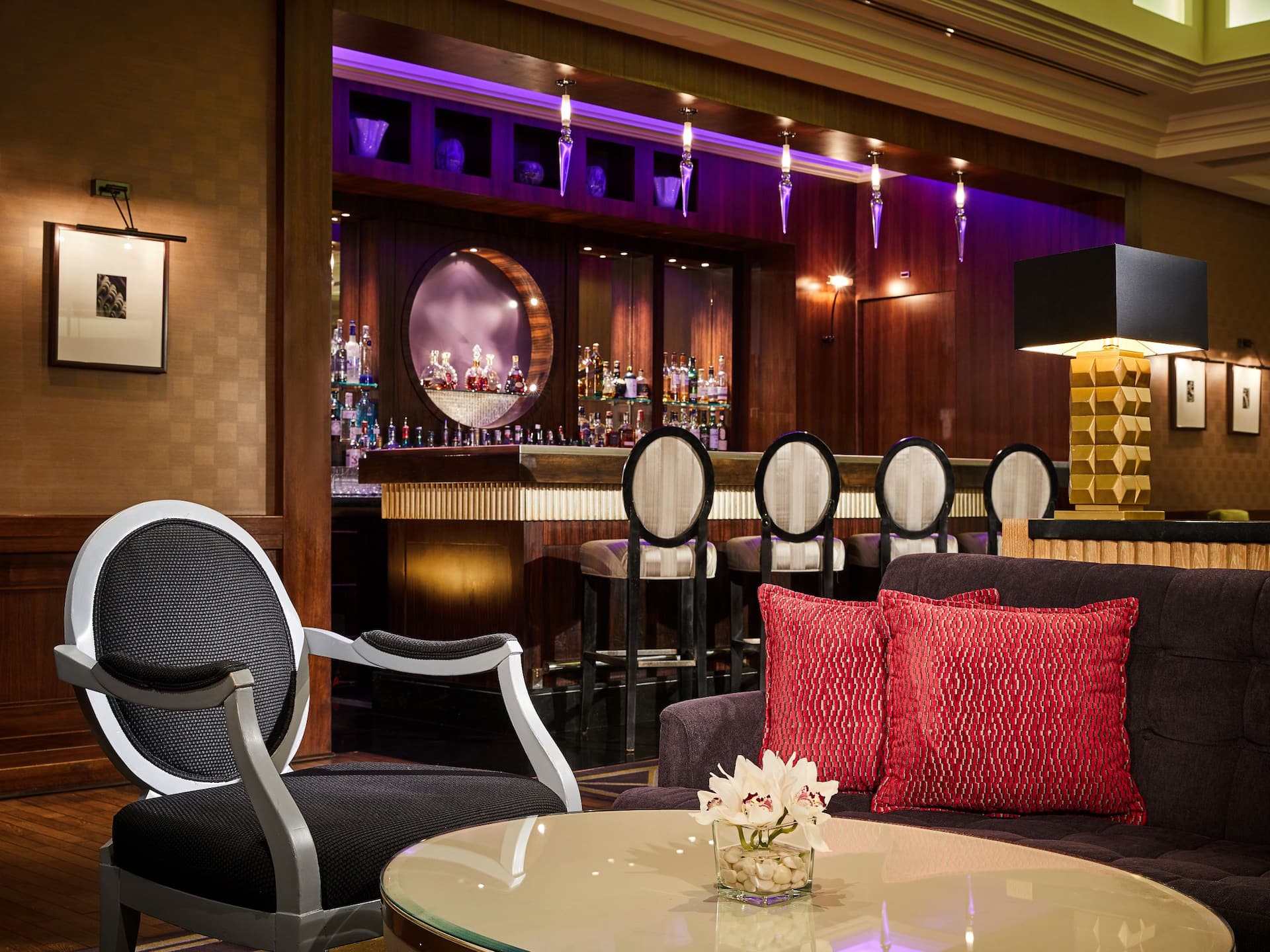 Stylish bar at Hyatt Regency Belgrade with cocktails, wines, and light bites in a sophisticated setting.