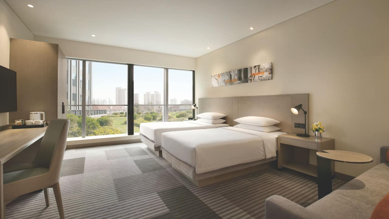 Garden View Two Twin Beds with sofa bed