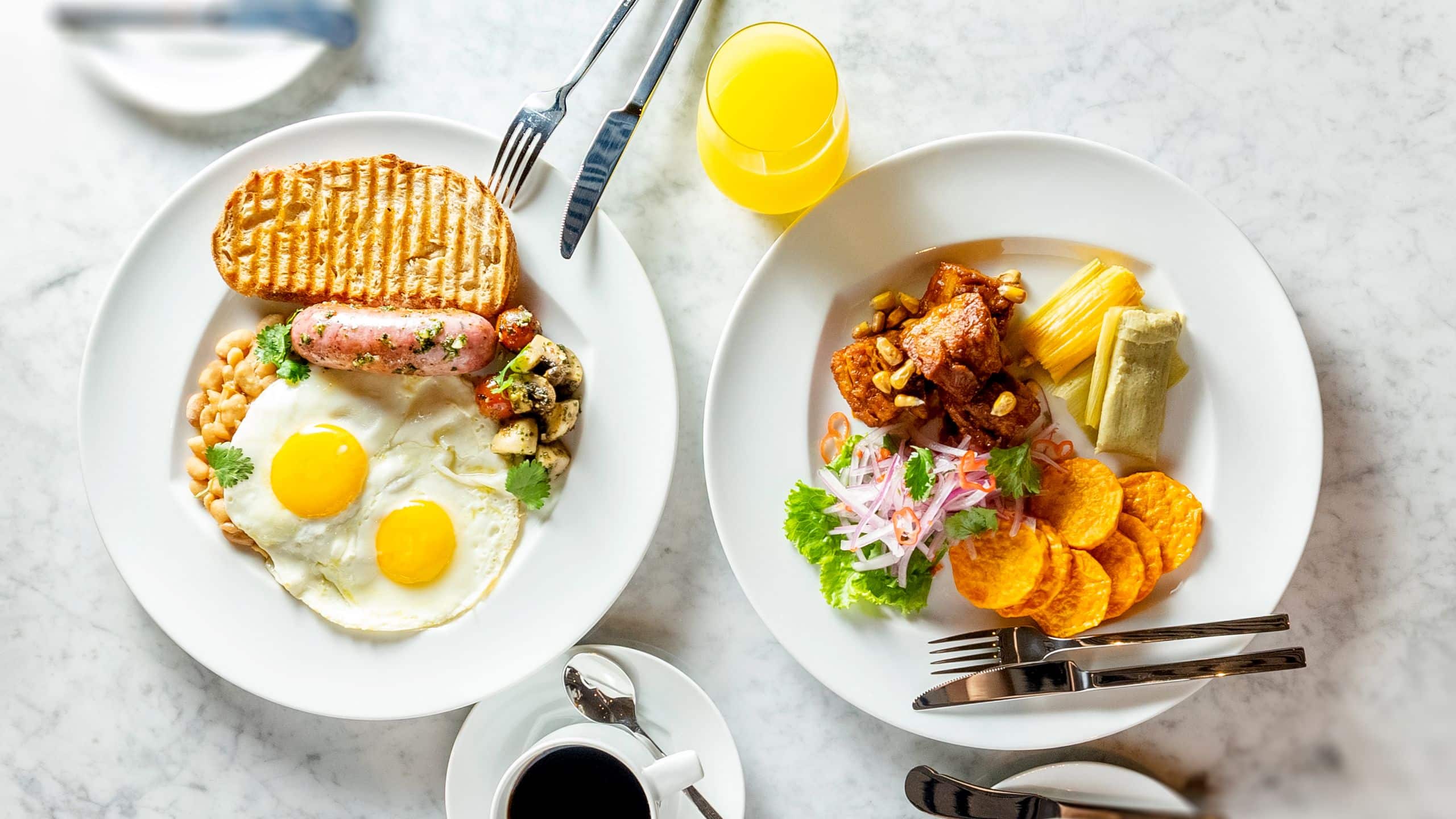 Plated breakfast, coffee and juice at Awake Deli