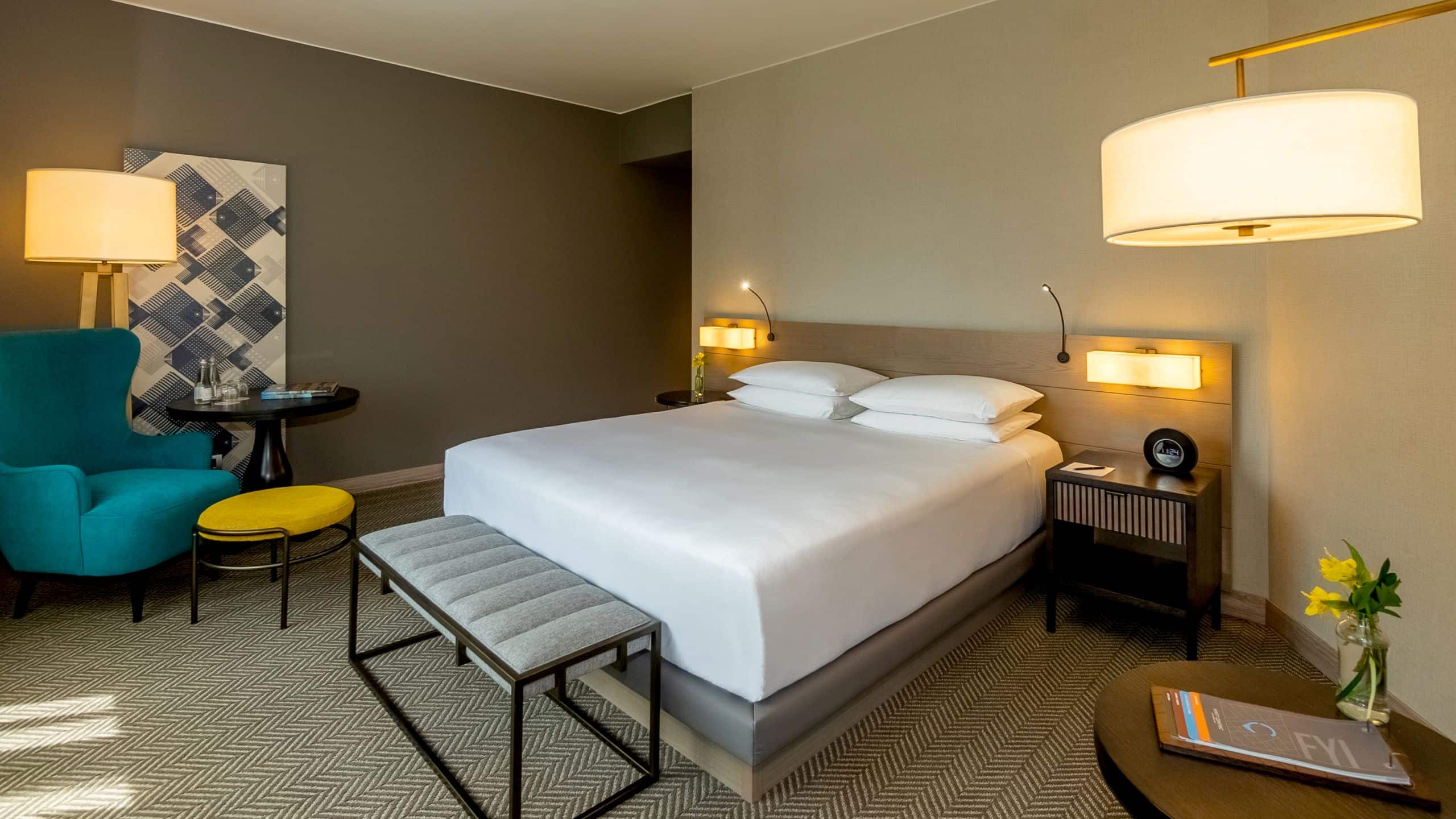 Junior Suite with King Bed, reading chair and bedroom bench