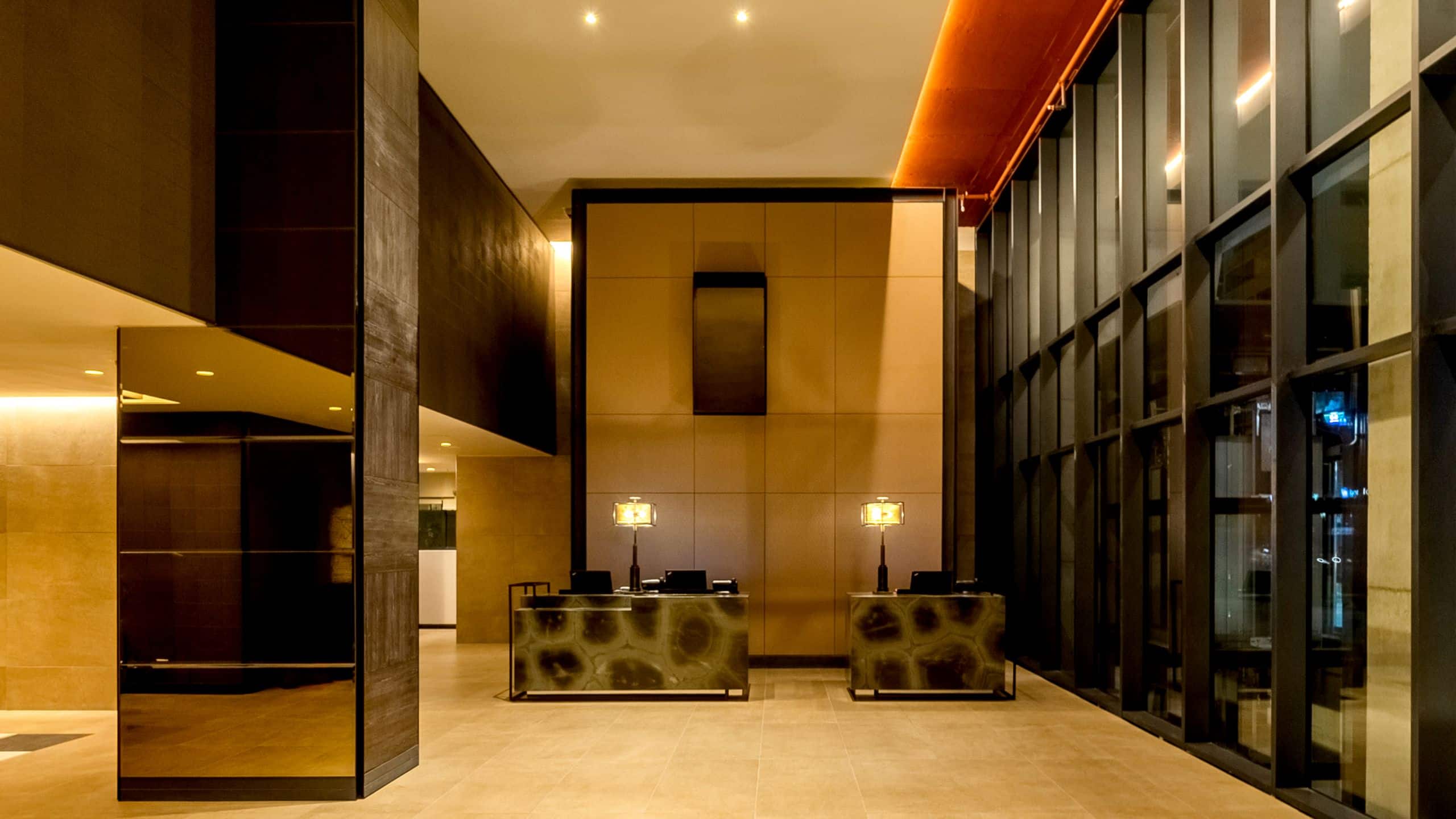 Front desk with floor to ceiling windows