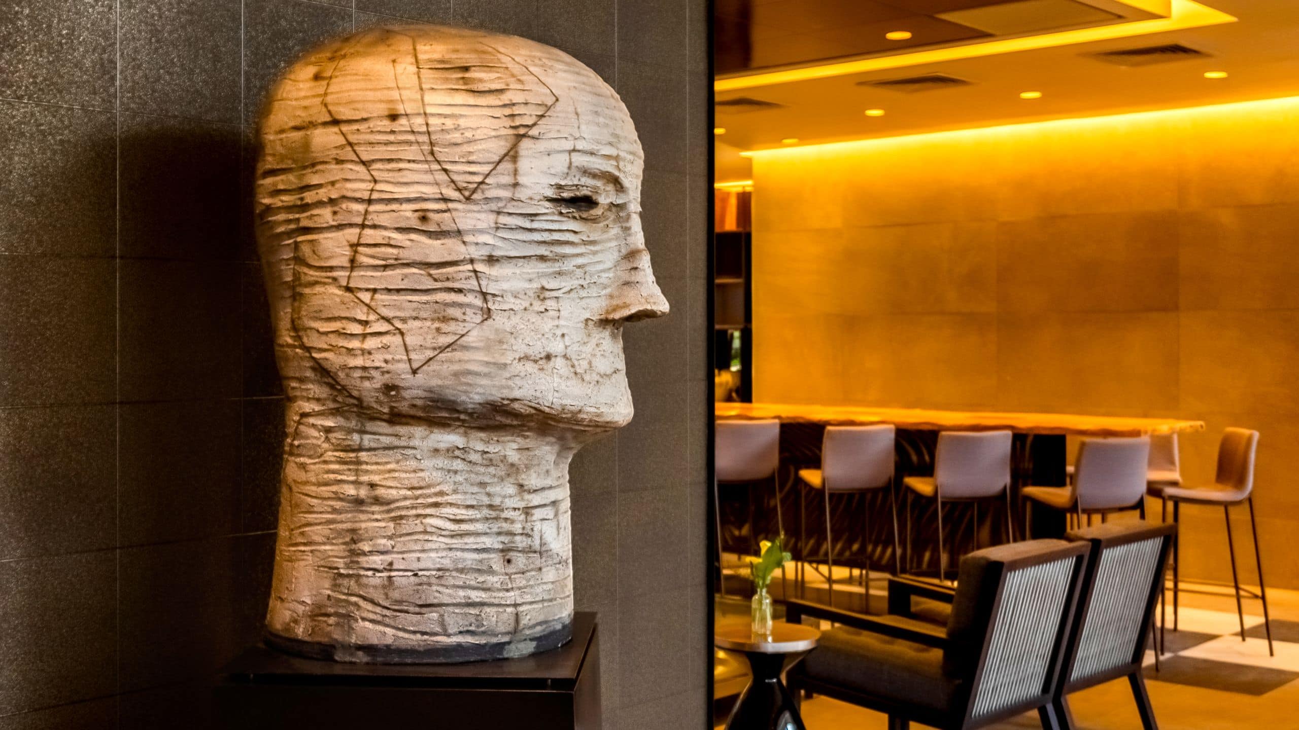 Lobby art piece, seating area and communal table