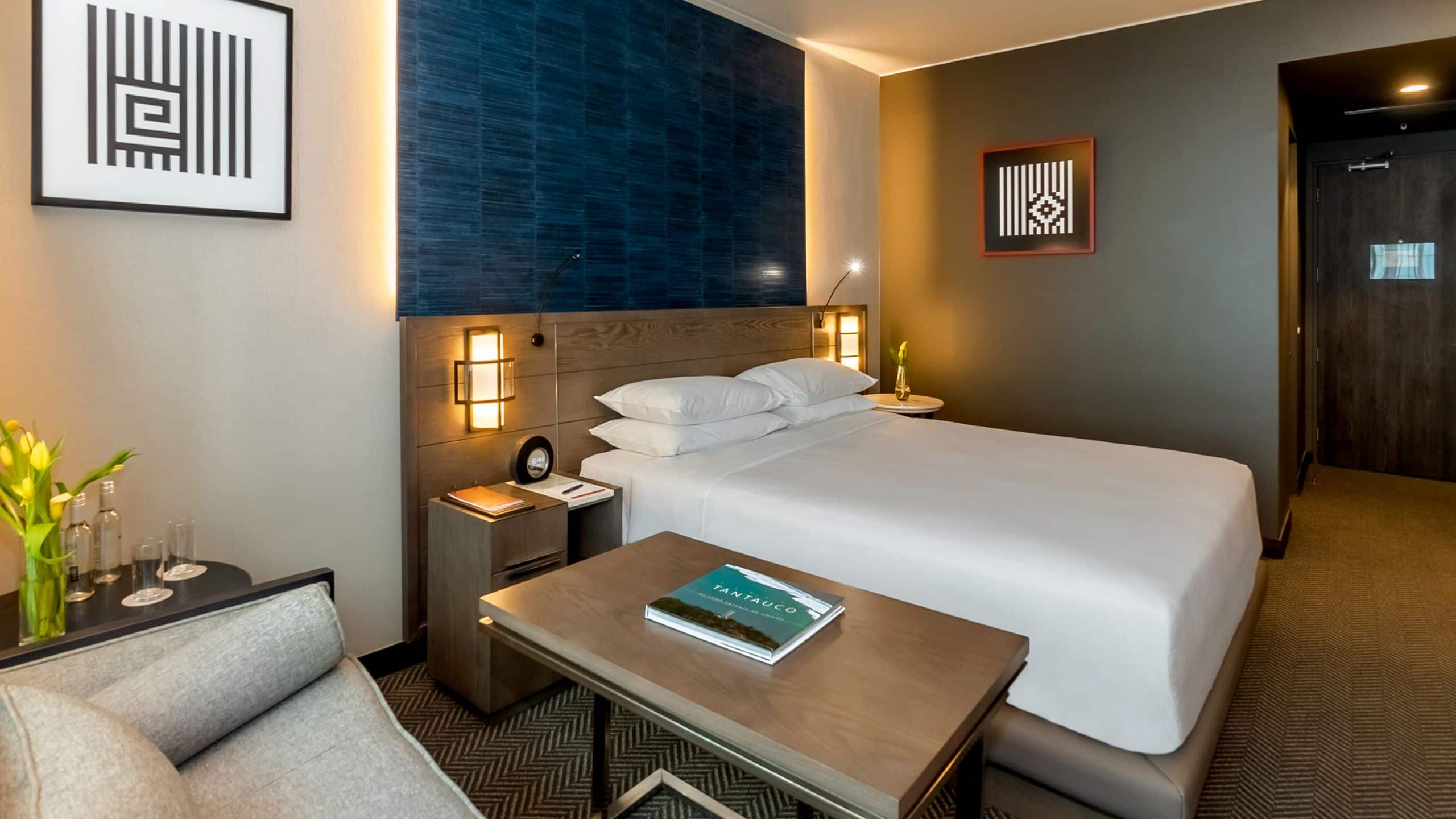 One King Bed guest room with sofa and two nightstands