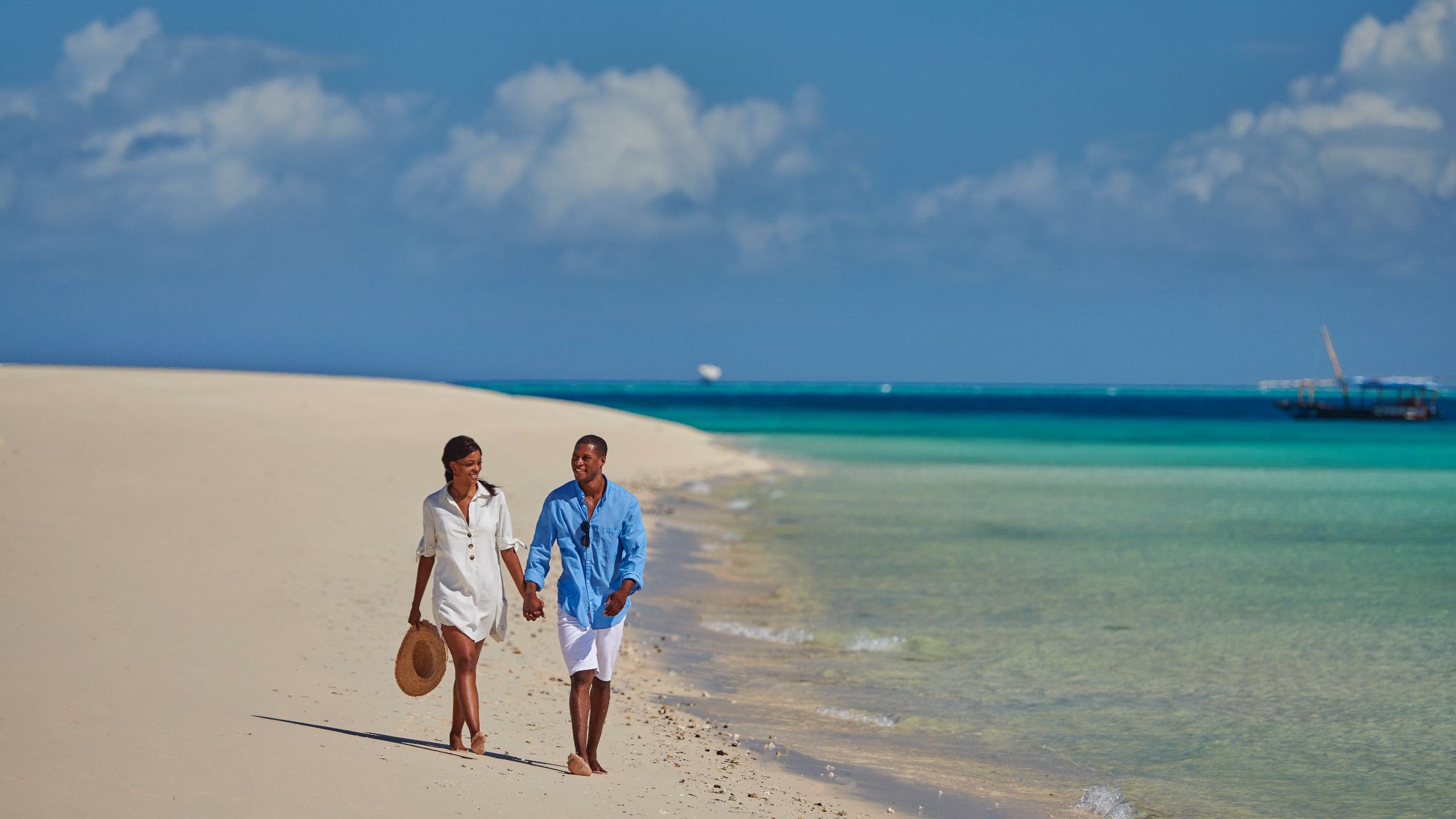 Park Hyatt Zanzibar Lifestyle Couple Walking On Beach