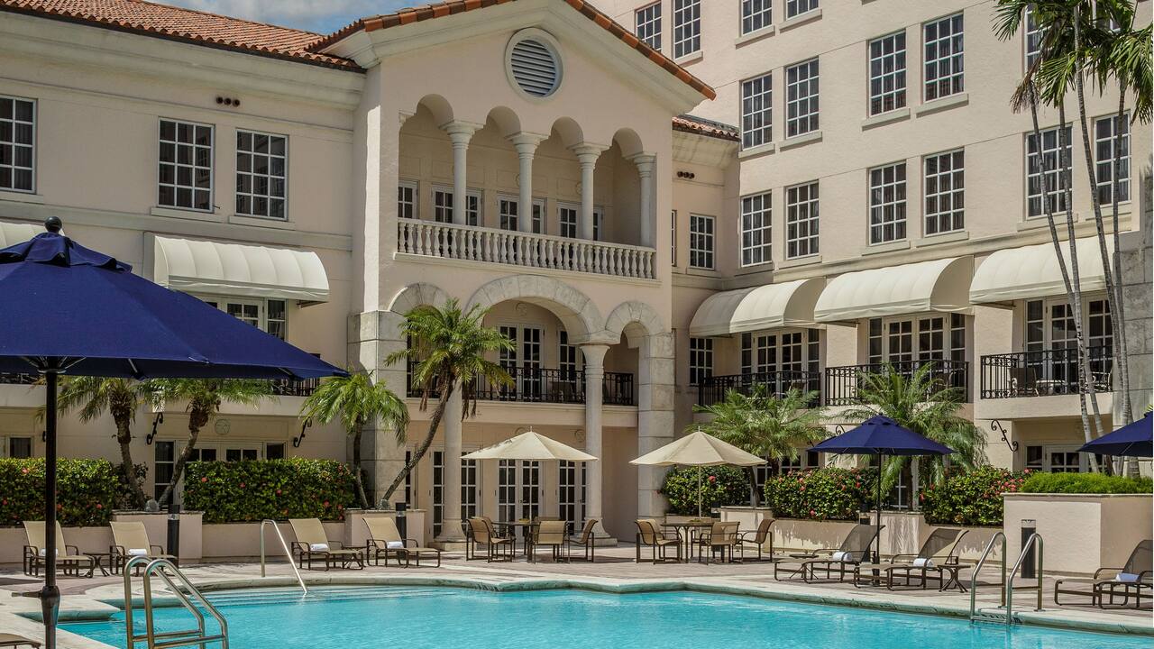 Fifth floor outdoor pool with loungers and sun umbrellas