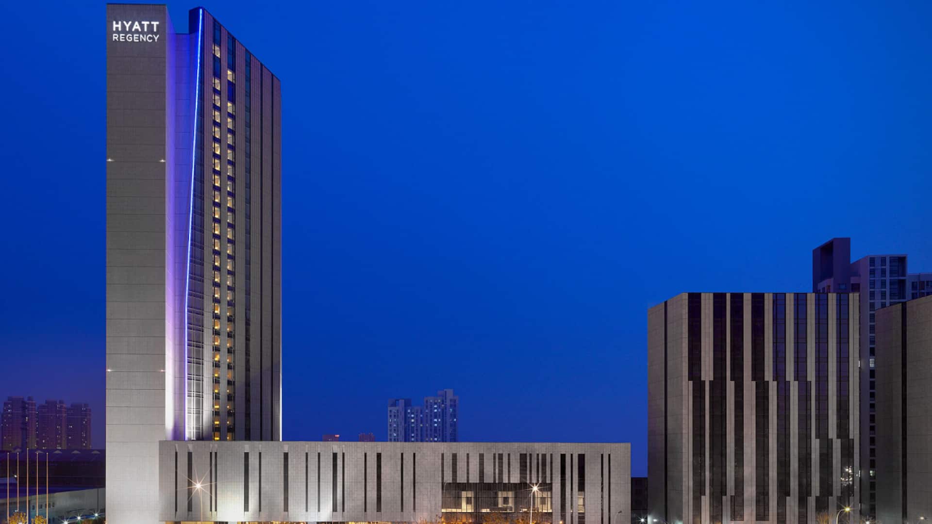 Hyatt Regency Tianjin East Hotel Exterior Night