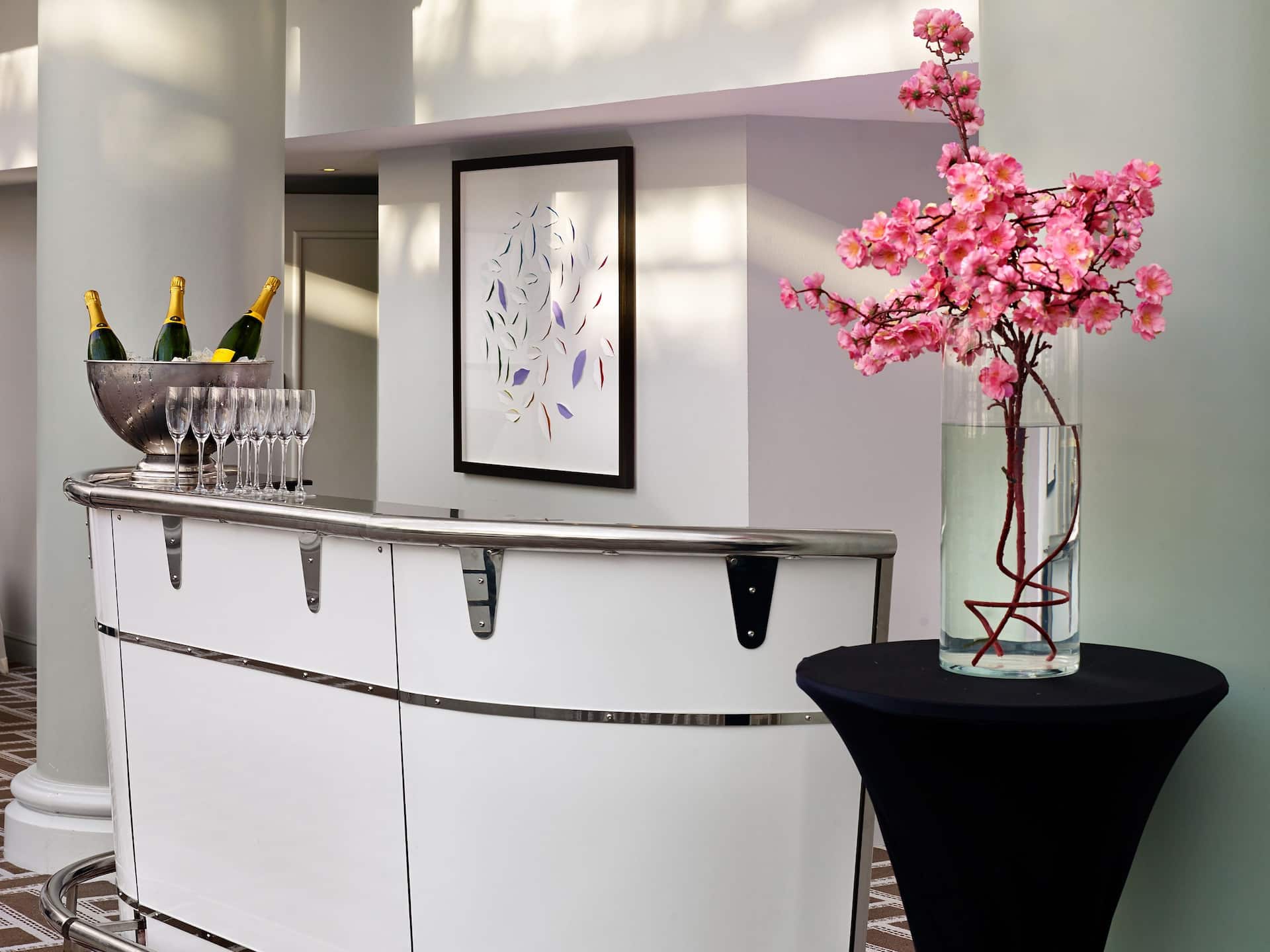 Lobby area with flowers and champagne