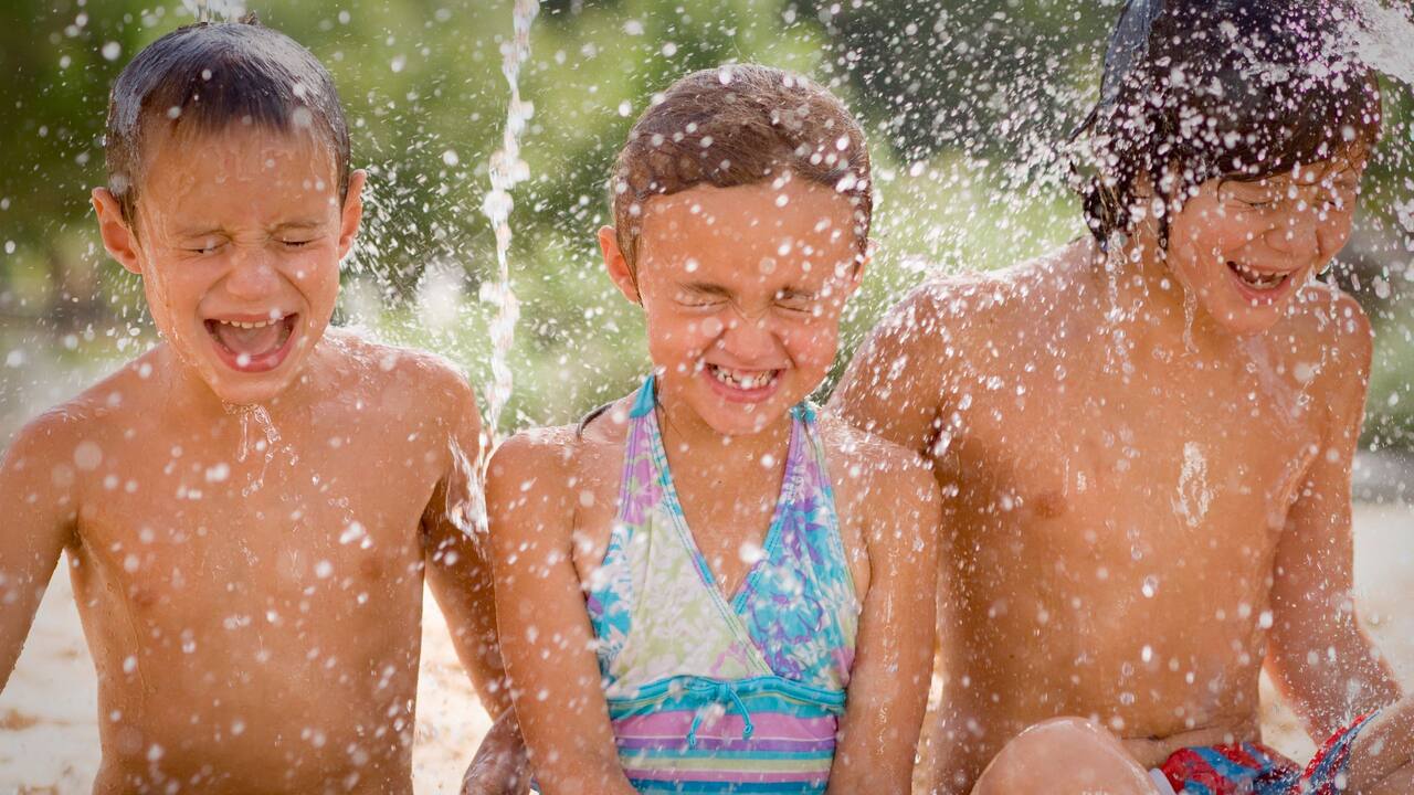 Kids Playing In Water