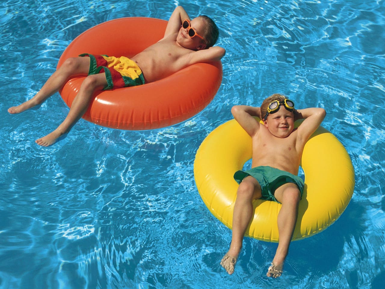 Kids swimming in the pool at Hyatt Place Salt Lake City/Cottonwood Utah hotel