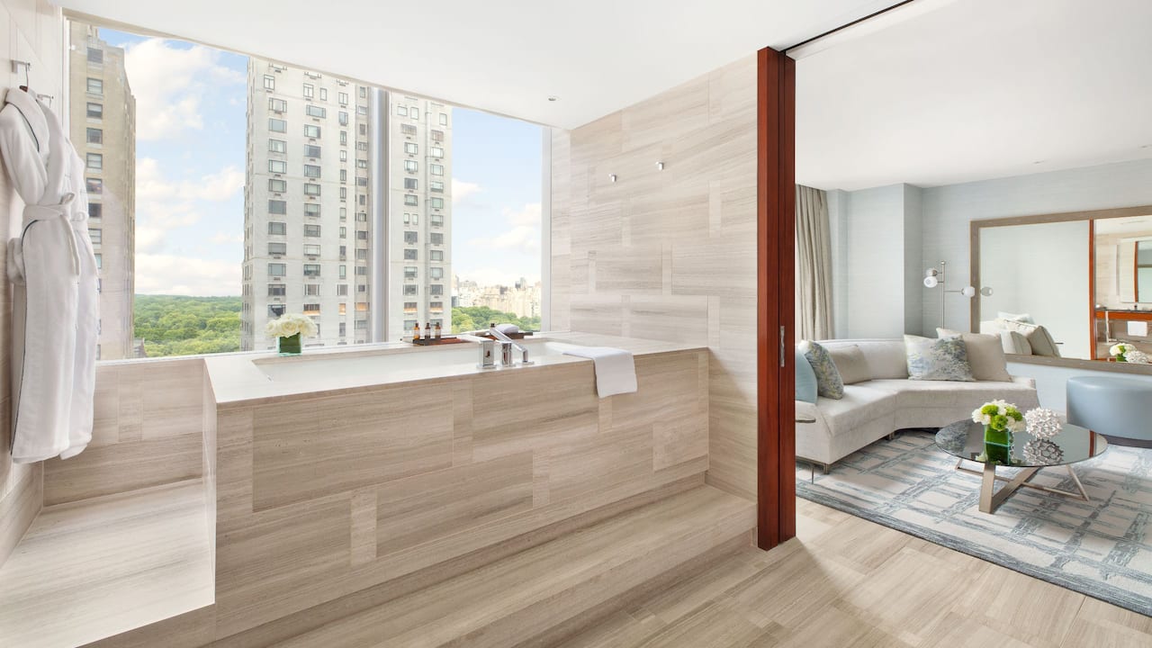 One Bedroom Presidential Suite bathroom with soaker tub and large windows