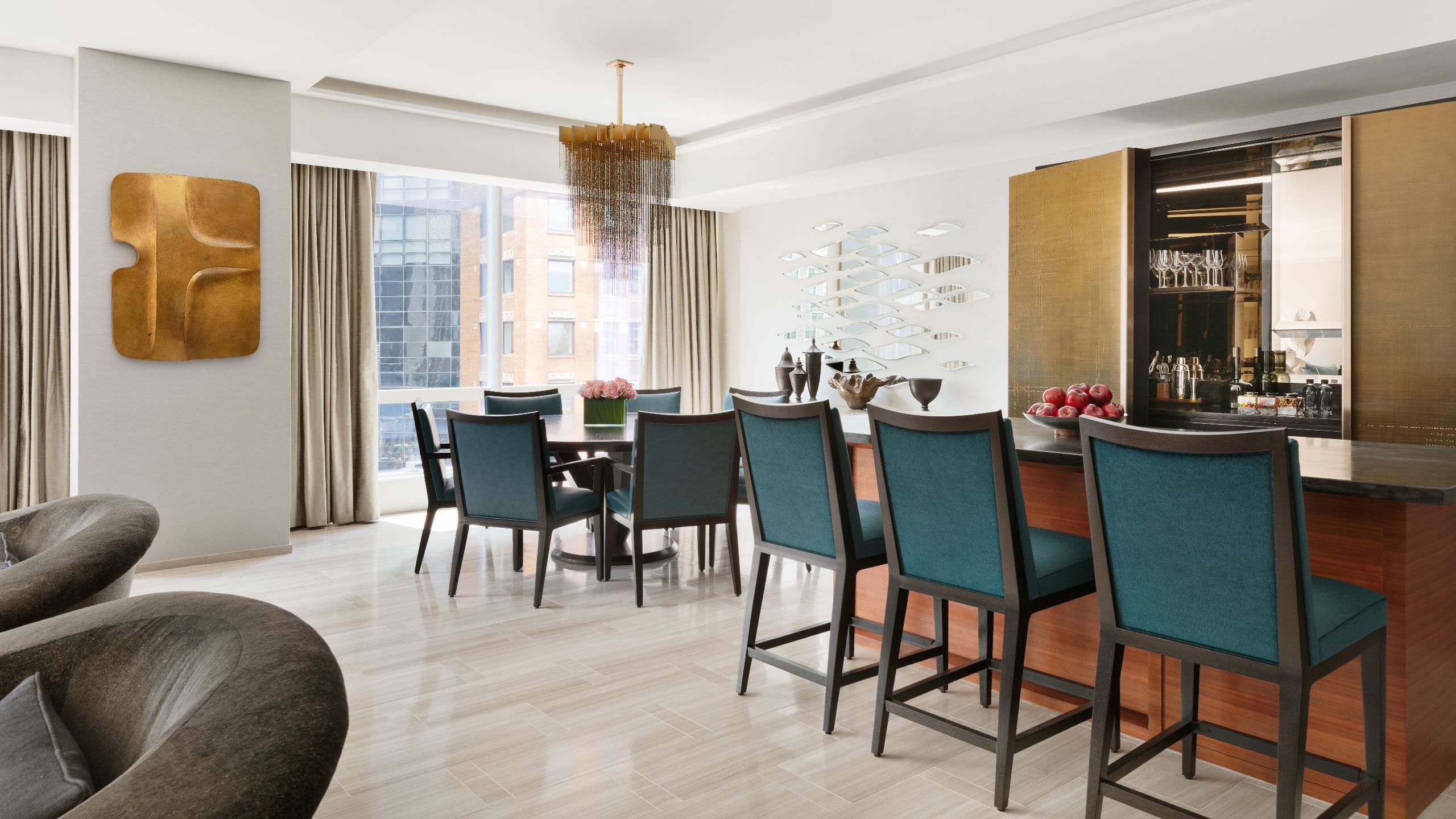 6 of 8 Stylish seating showing the dining area and bar of the suite