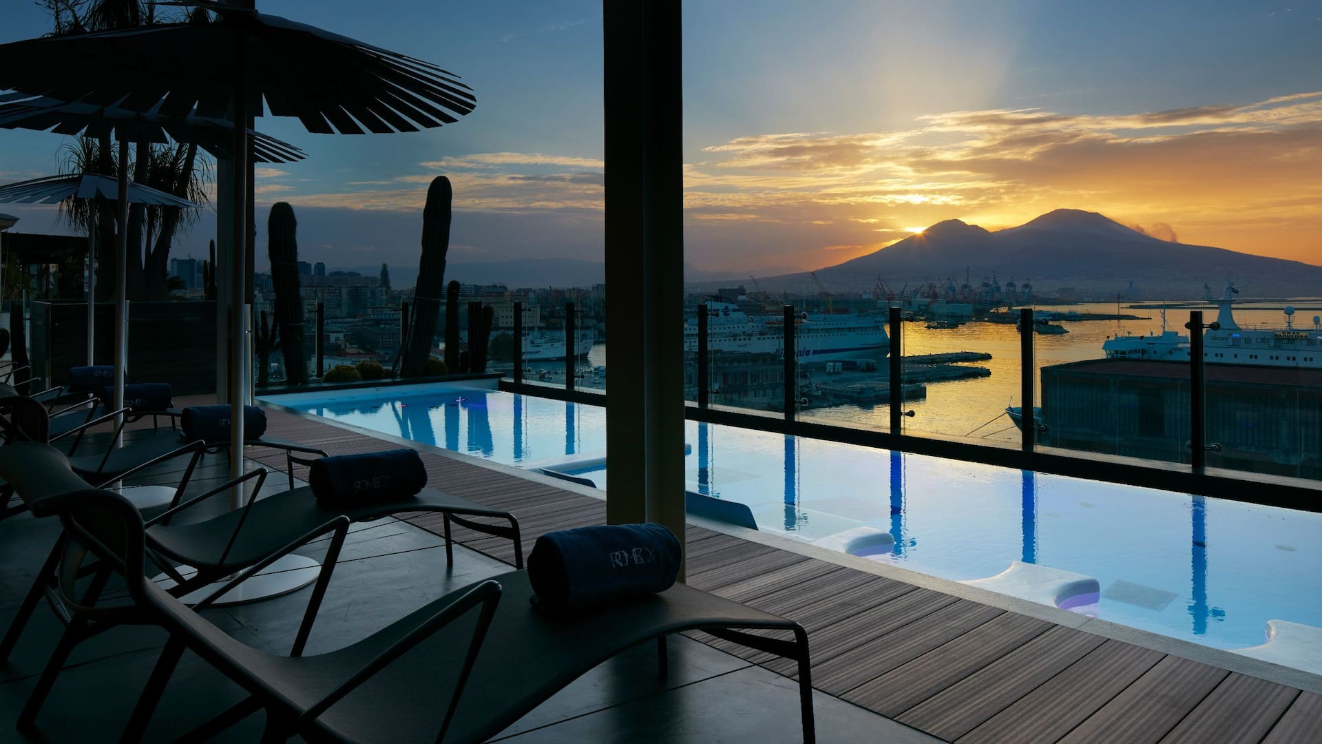 Hotel pool with mountain sunset view