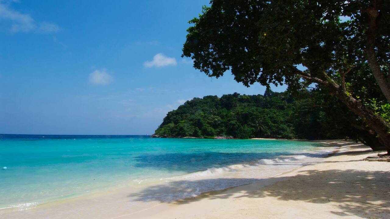 Tanjong Jara emerald blue cove and white sand beach