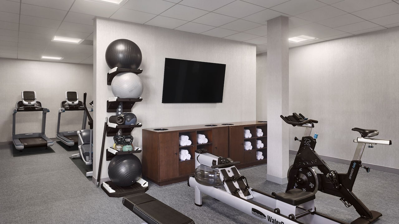 Fully equipped fitness center with cardio and weights