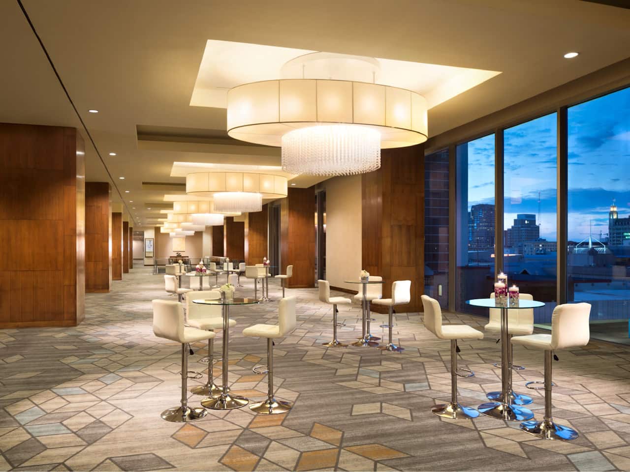 Ballroom Foyer event space with city views at dusk