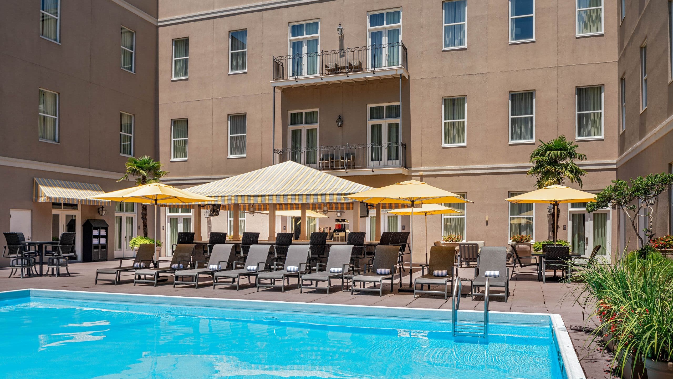 1 of 1 Hyatt Centric French Quarter New Orleans Yellow Umbrella Pool Deck