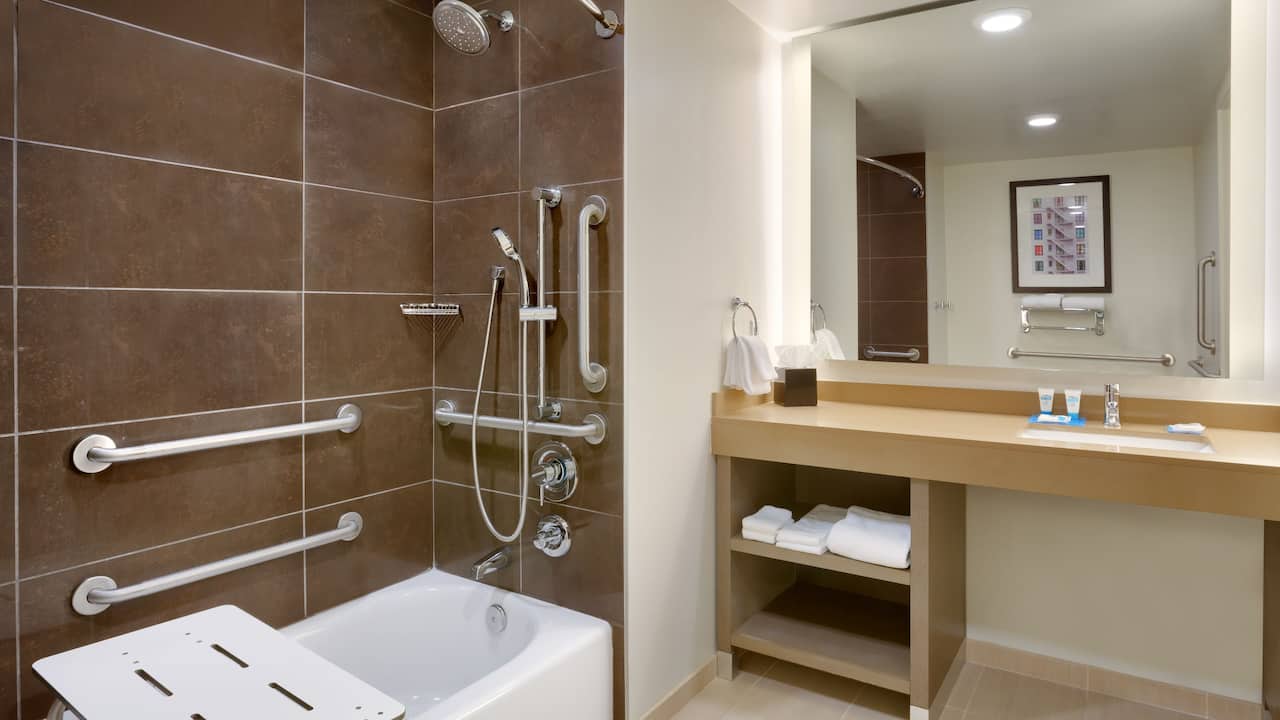 ADA Compliant Hotel Bathroom With A Roll-In Shower 