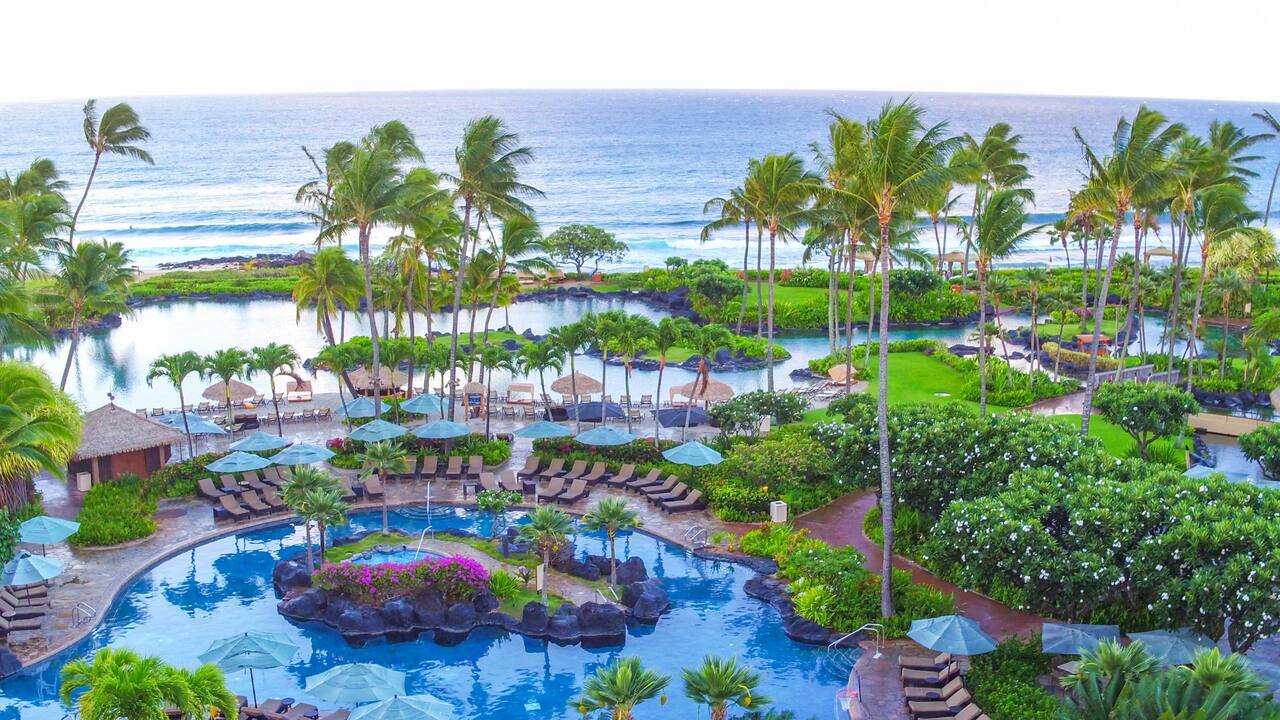 Aerial view of the lower pool and Saltwater Lagoon swimming areas at Grand Hyatt Kauai Resort and Spa