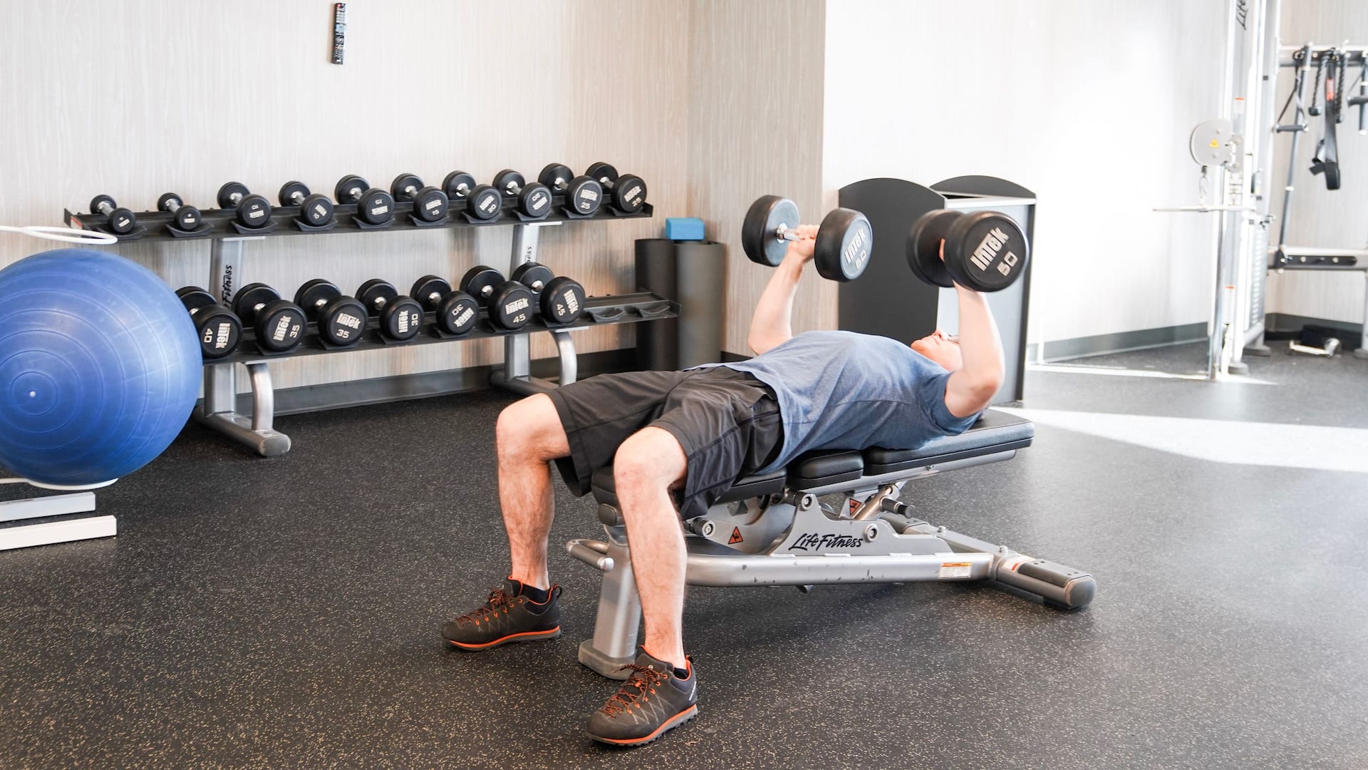 Hyatt House HH_P303 Man Lifting Weights