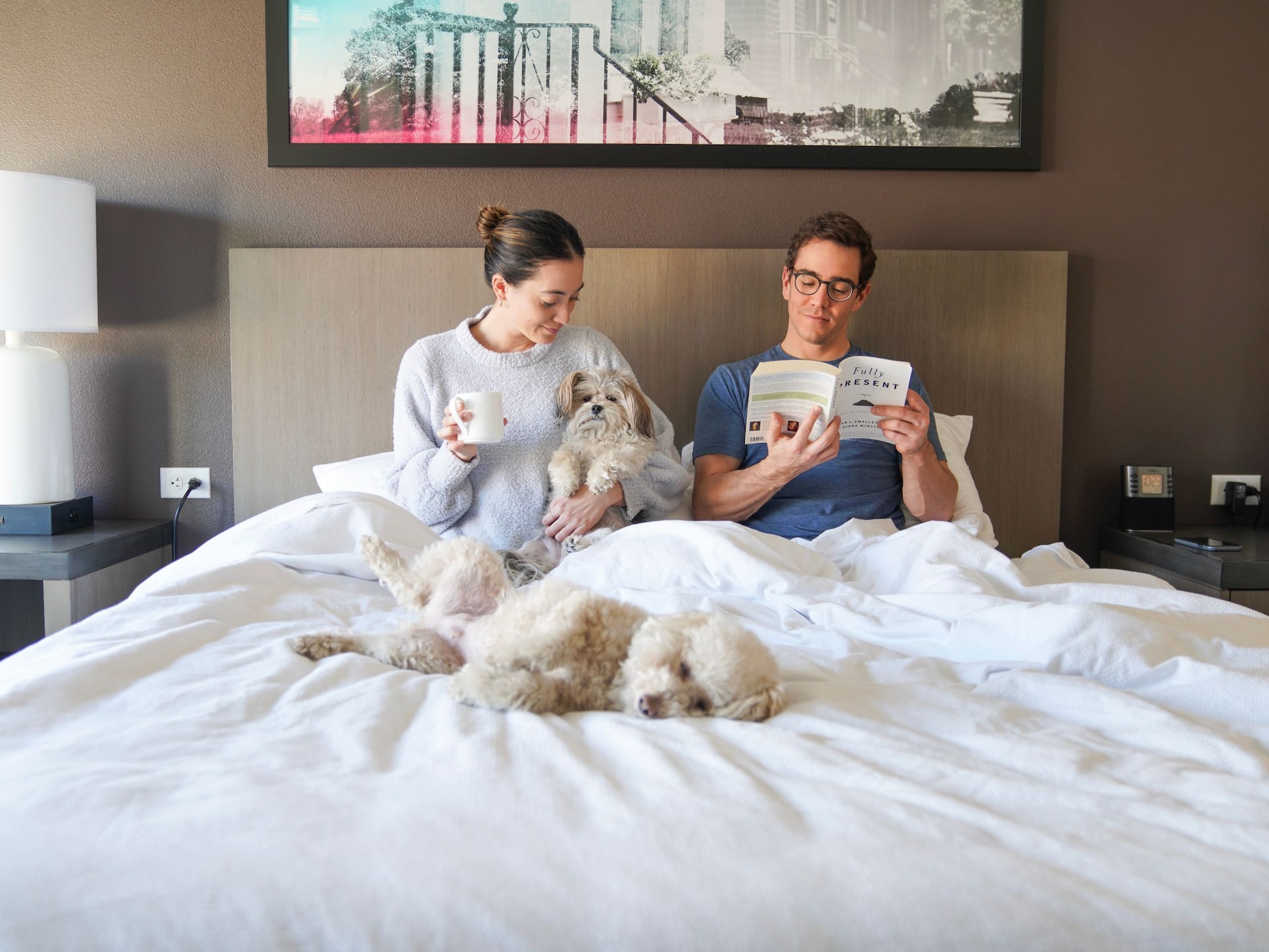 Hyatt House HH_P325 Couple in Bed with Dogs
