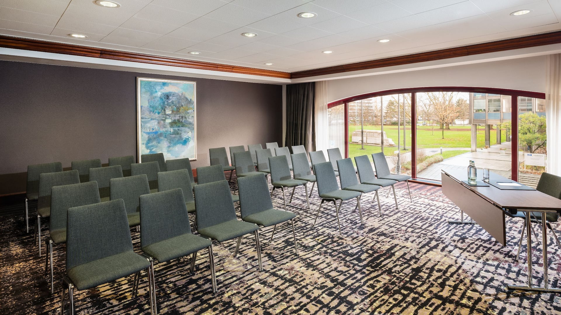 6 of 8 Seated meeting room with daylight at Hyatt Regency Cologne