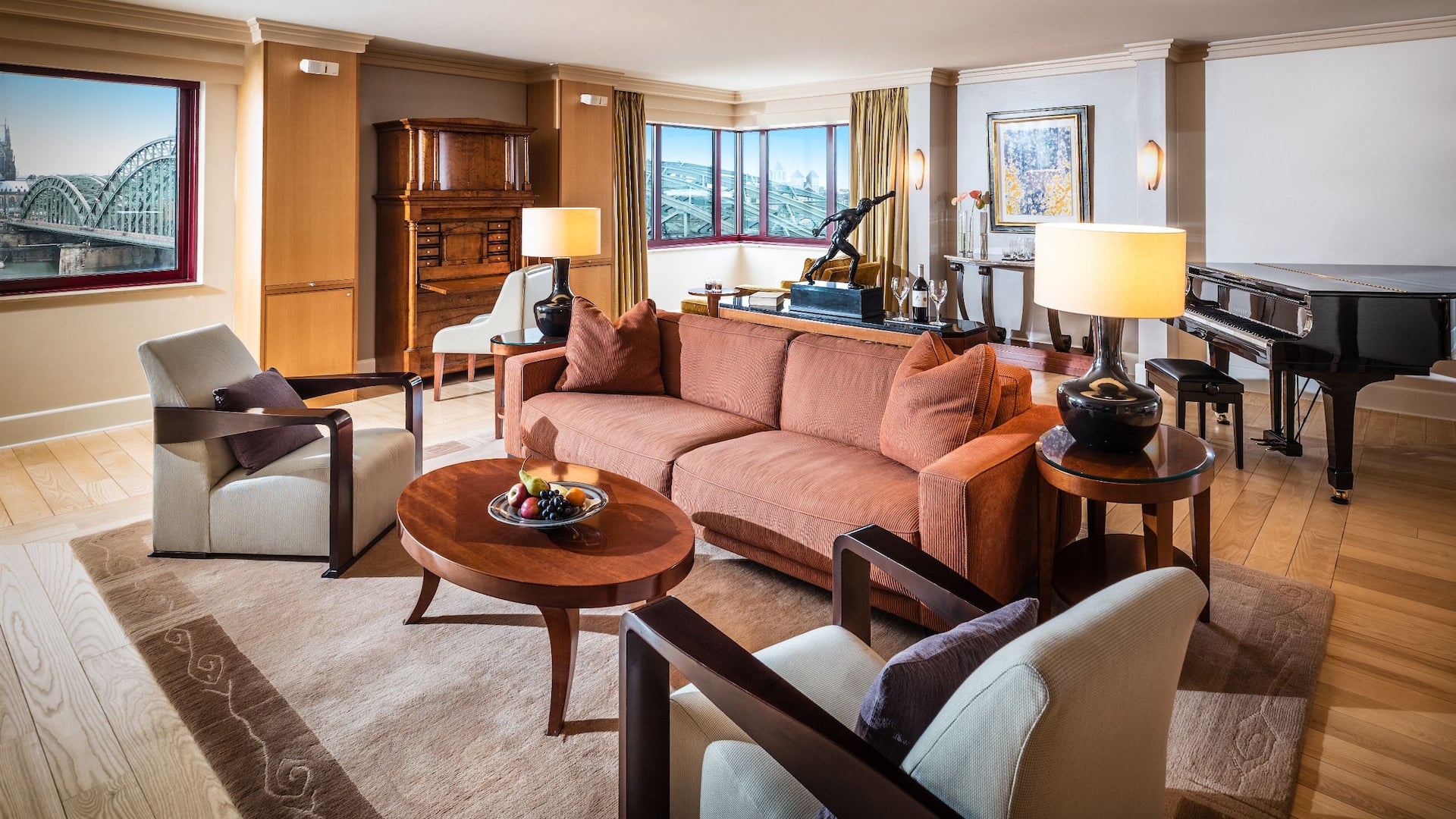 Large living room with grand piano in the Presidential Suite of Hyatt Regency Cologne