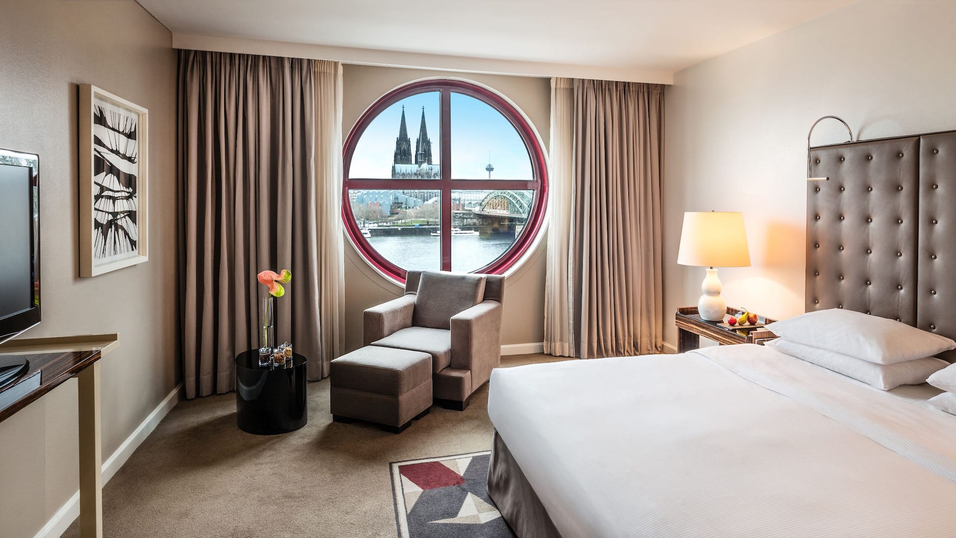 Modern Regency Suite with bullseye window and cathedral view at Hyatt Regency Cologne