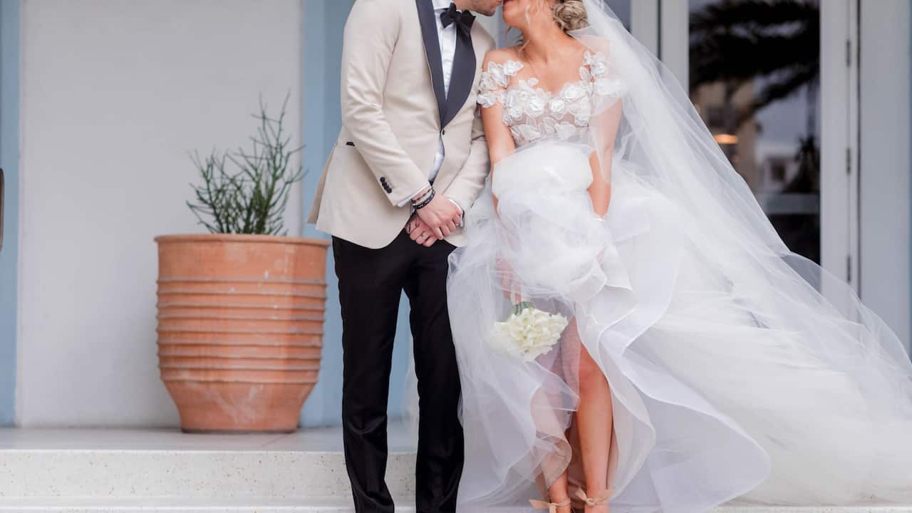 The Confidante Miami Beach bride and groom