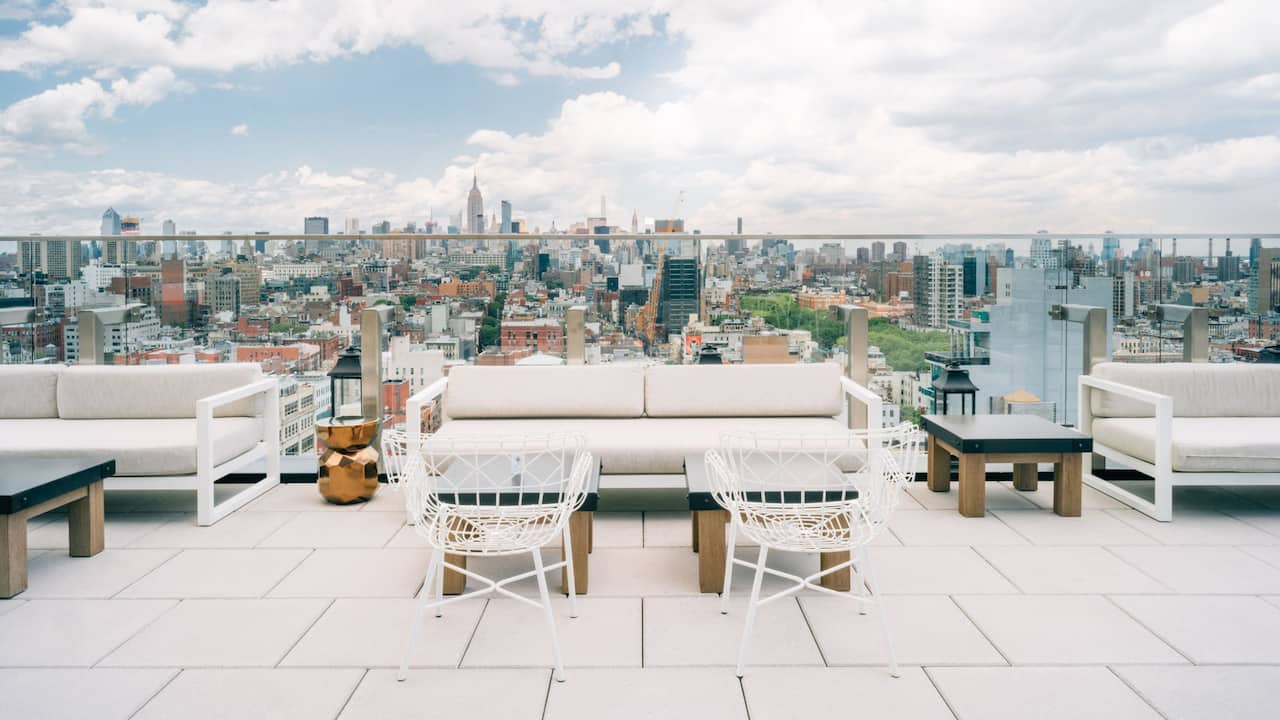 Rooftop Terrace seating area with views of the city