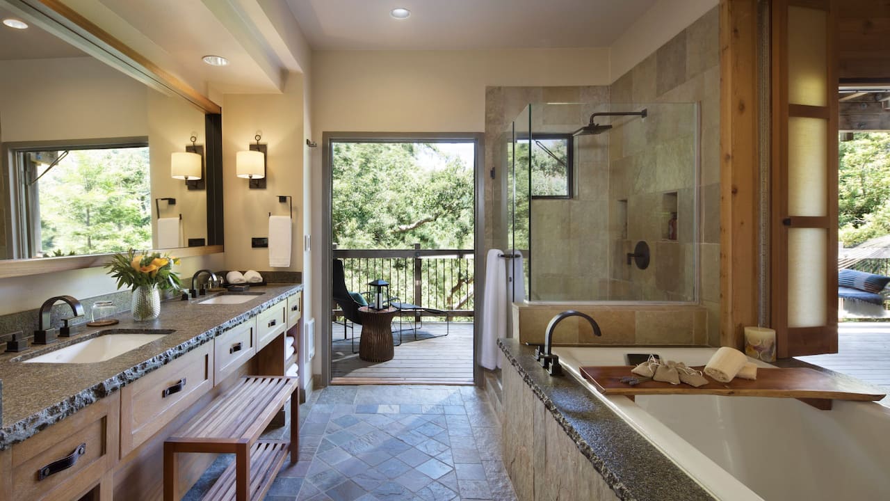 Big Sur Suite bathroom with soaking tub and access to the private deck