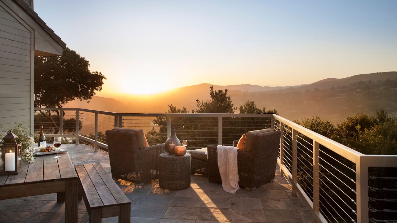 Carmel Suite private deck with seating area and mountain views