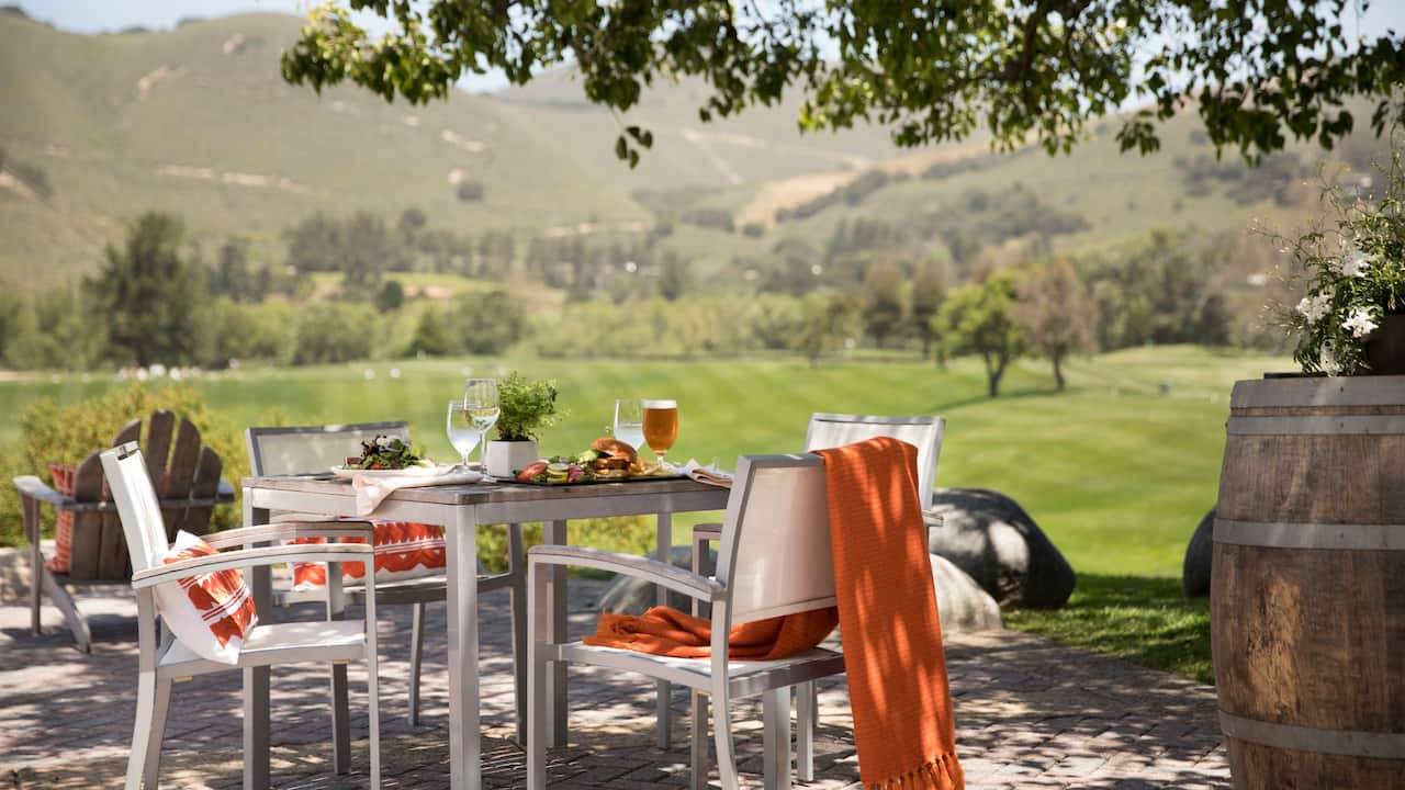 River Ranch Café outdoor seating area with mountain and ranch views