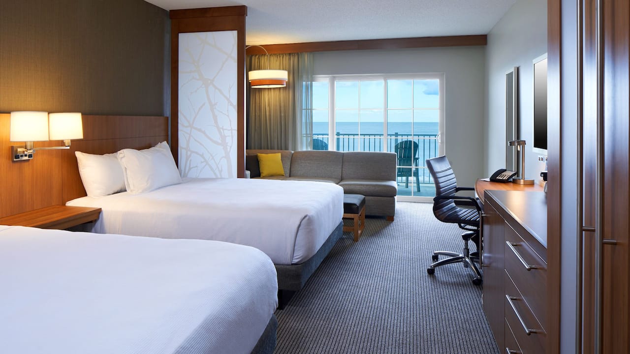 Oceanfront View guestroom with two queen beds, Cozy Corner and balcony