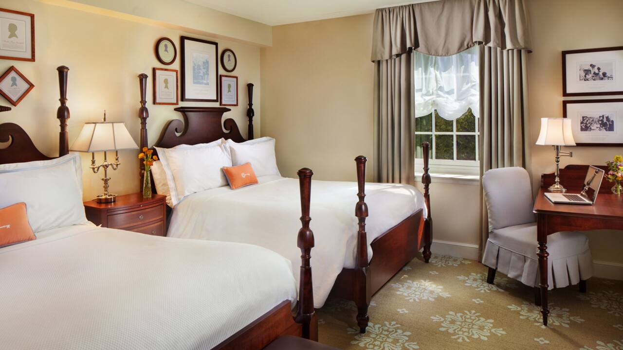 Two Queen Beds Premium guest room with work desk