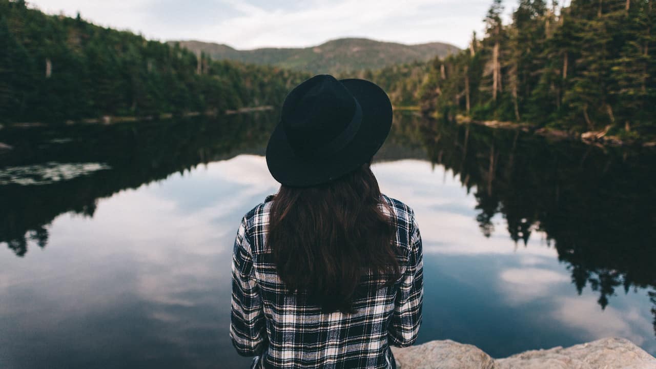 Woman Overlooking Lake