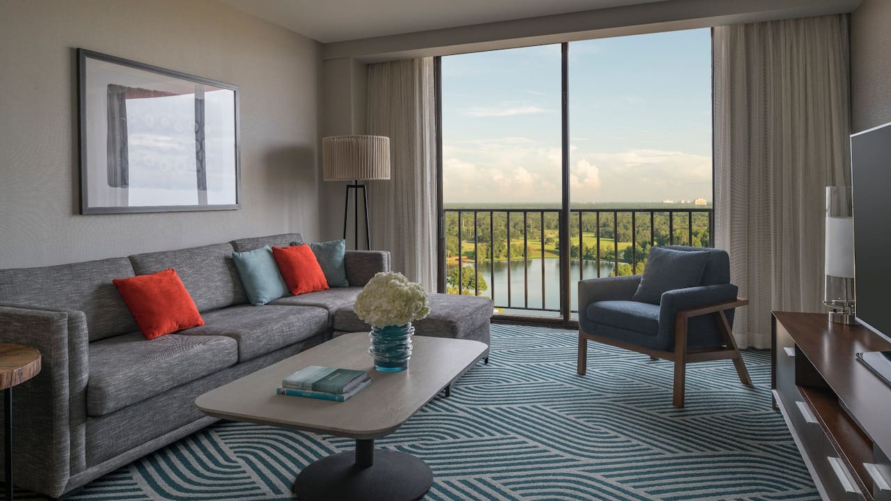 Junior Suite living room with lake view and seating area