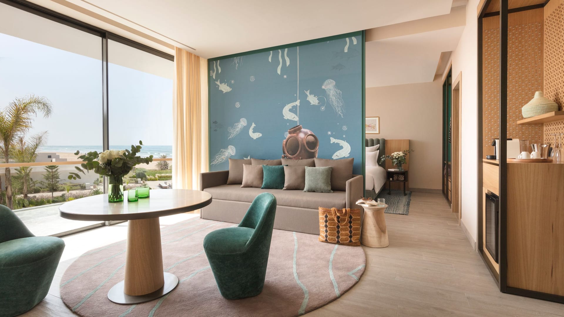 Spacious room featuring a seating area, bedroom, and cozy coffee corner, with  stunning sea view.