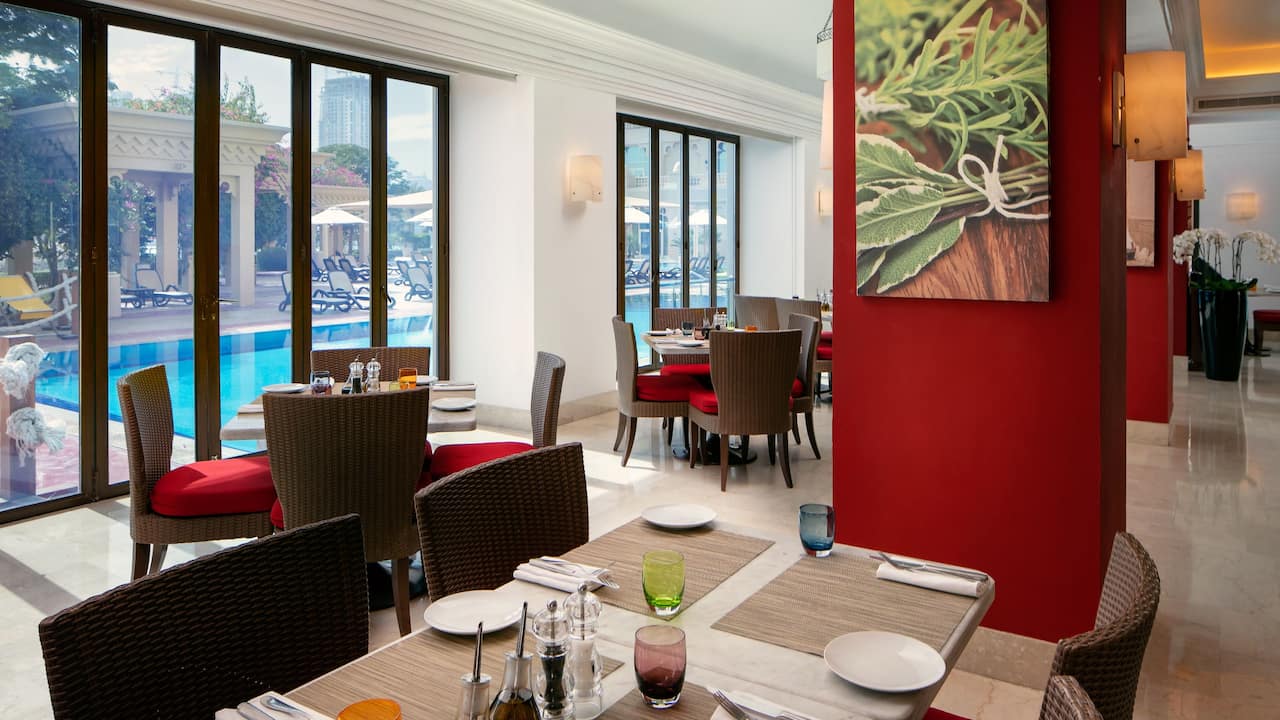 Rocca and pool Restaurant at Grand Hyatt Doha Hotel & Villas