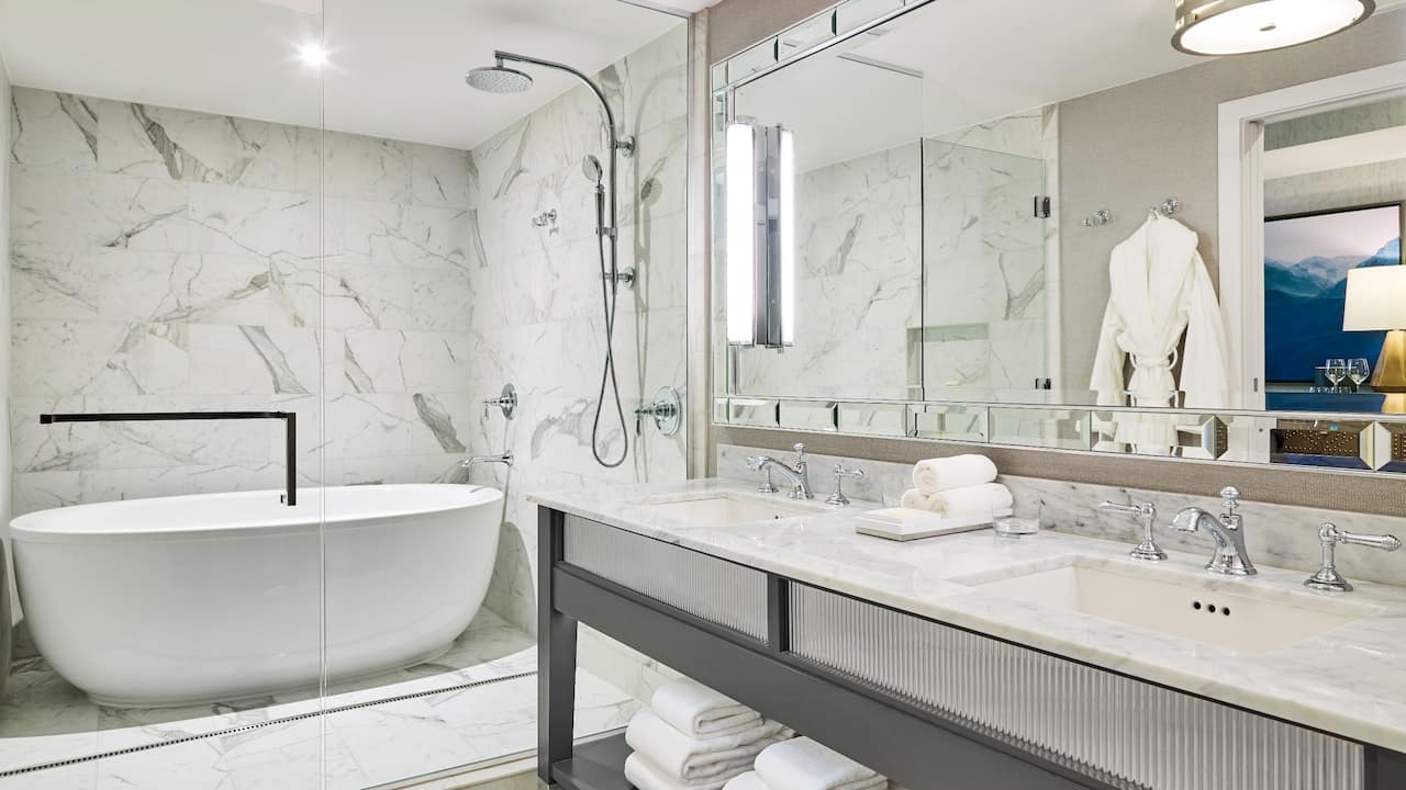 Guest bathroom with double vanity and soaking tub