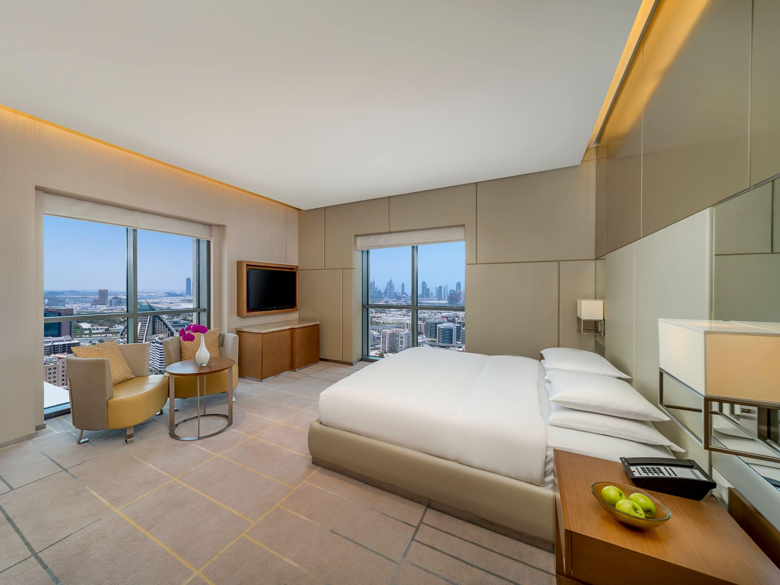 Hyatt Regency Dubai Creek Heights - Enjoy extra space and comfort in a modern suite with a spacious living area and city views.