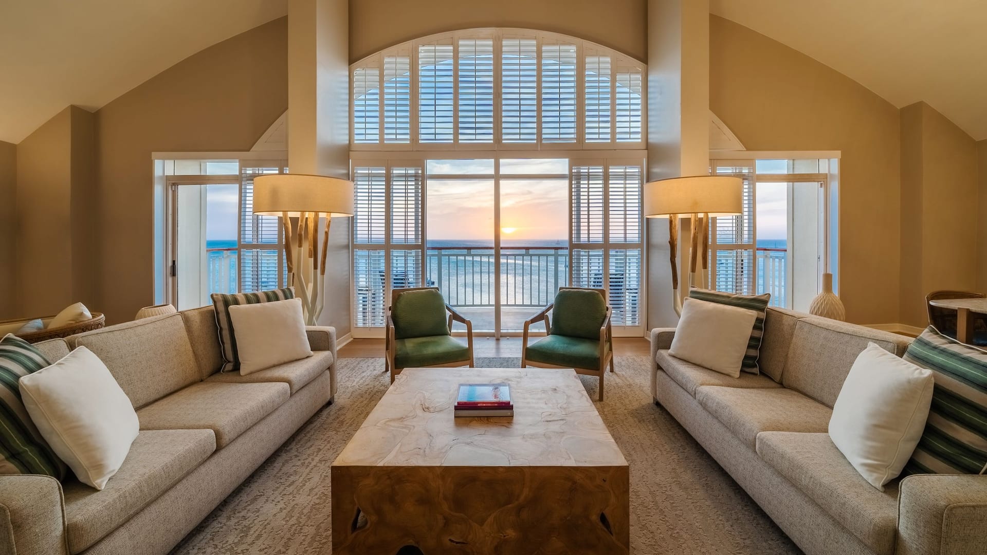 Hotel suite with a sunset ocean view at Hyatt Regency Aruba Resort Spa and Casino