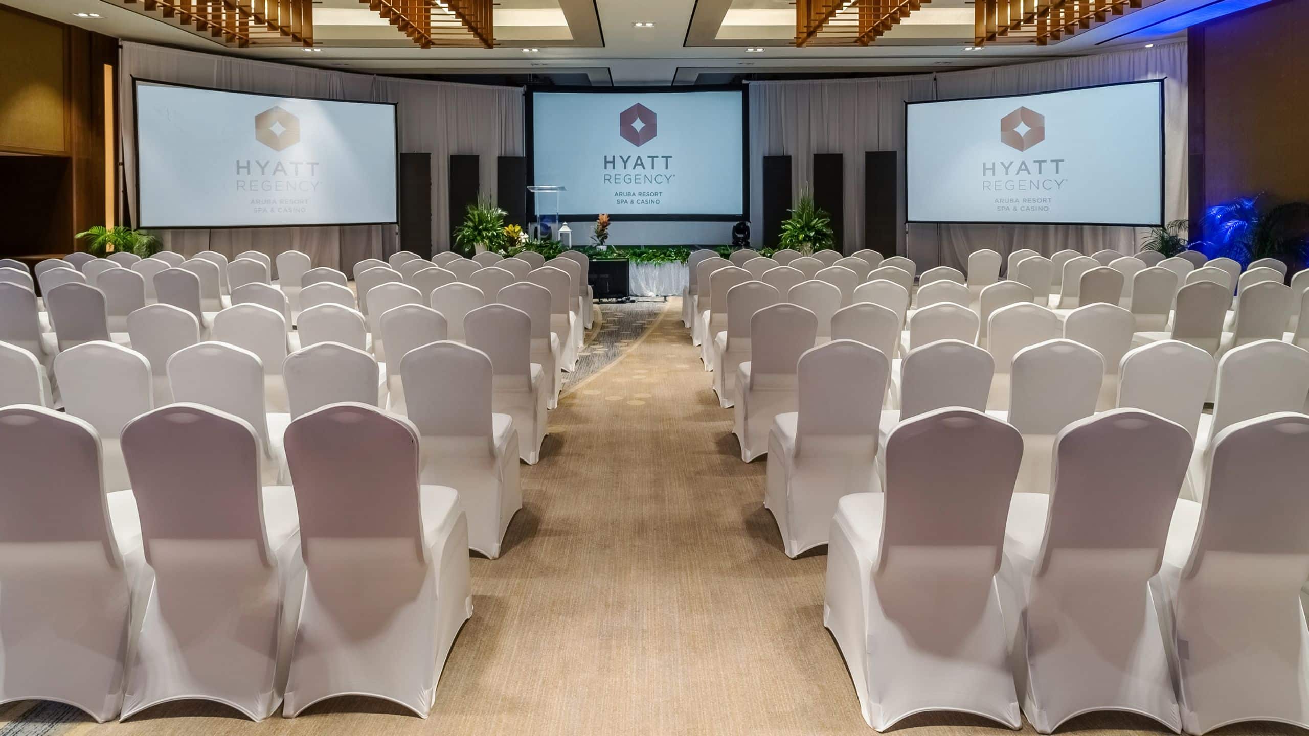 White chairs in a large meeting ballroom