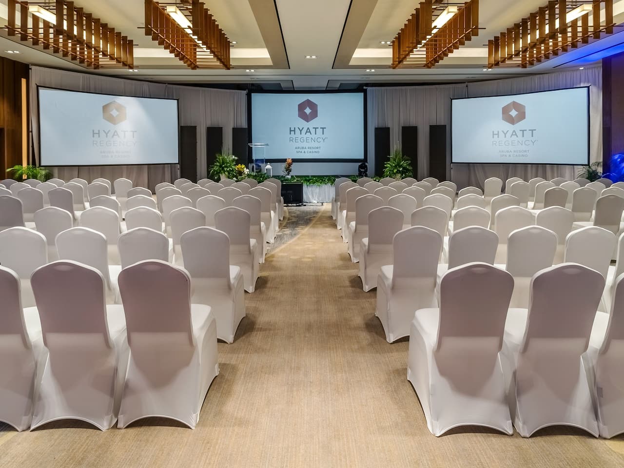 White chairs in a large meeting ballroom