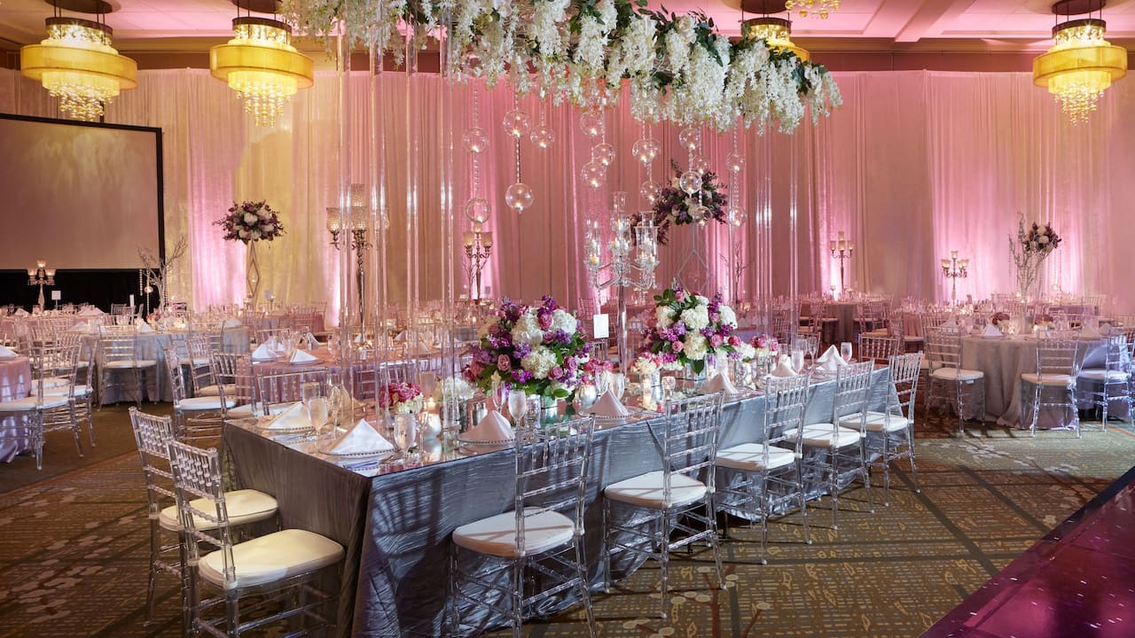 Grand Ballroom wedding reception seating with elegant draped florals